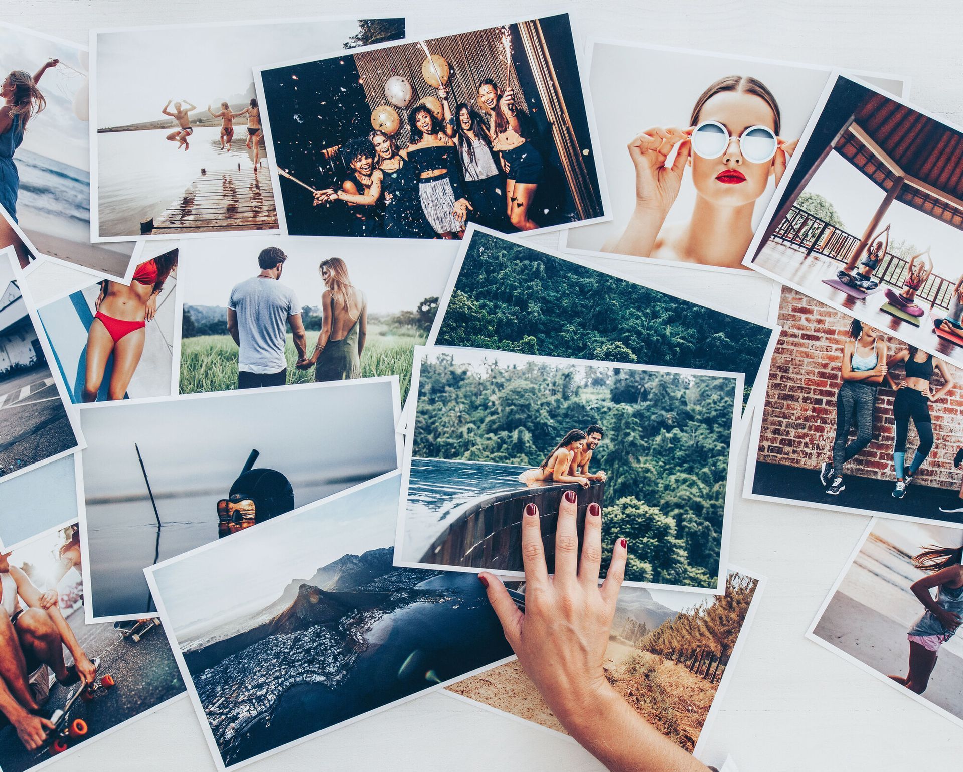 Hand holding pictures